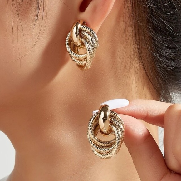 BellanBlue Jewelry - Luxe Gold Tone Stainless Steel Twist clip Earrings